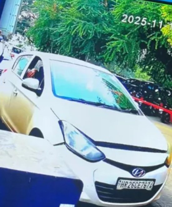 A CCTV picture of the white Hyundai i20 while entering the parking lot