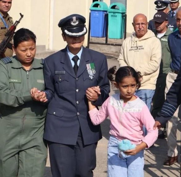 Afshan Syal with her daughter when her husband’s body was taken to his village