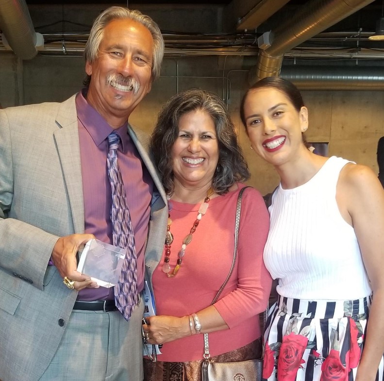 John Beam with his wife and daughter