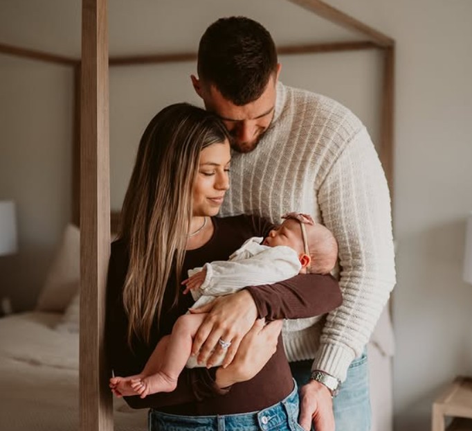 Dani Watt with her husband T. J. Watt and daughter