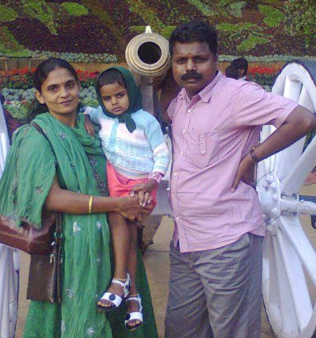 Honey Varghese with her husband and daughter