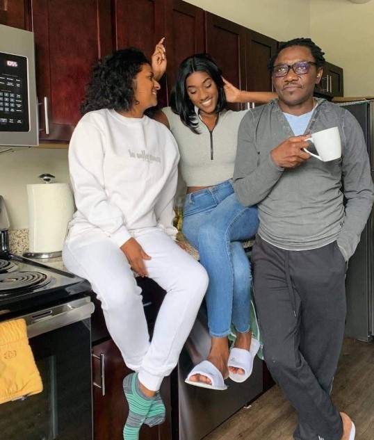Kamala Eyango with her parents