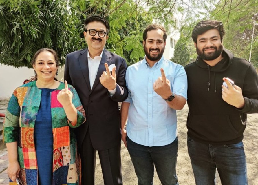 Navneet Sehgal with his wife and kids