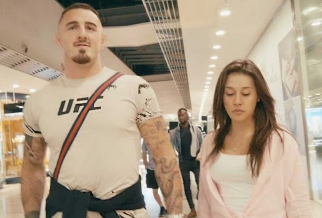 Tom Aspinall with his wife