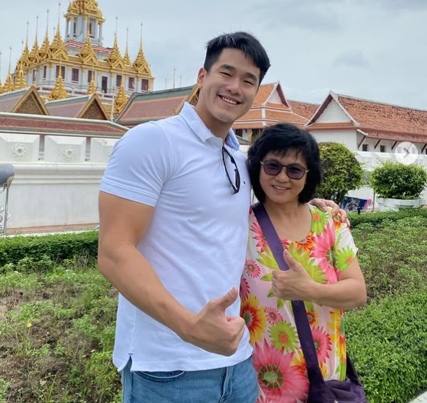 Alex Chee with his mother