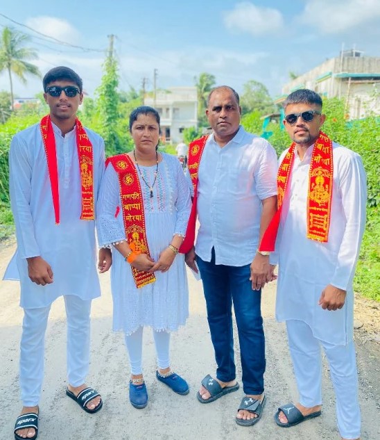 Henil Patel with his parents and brother