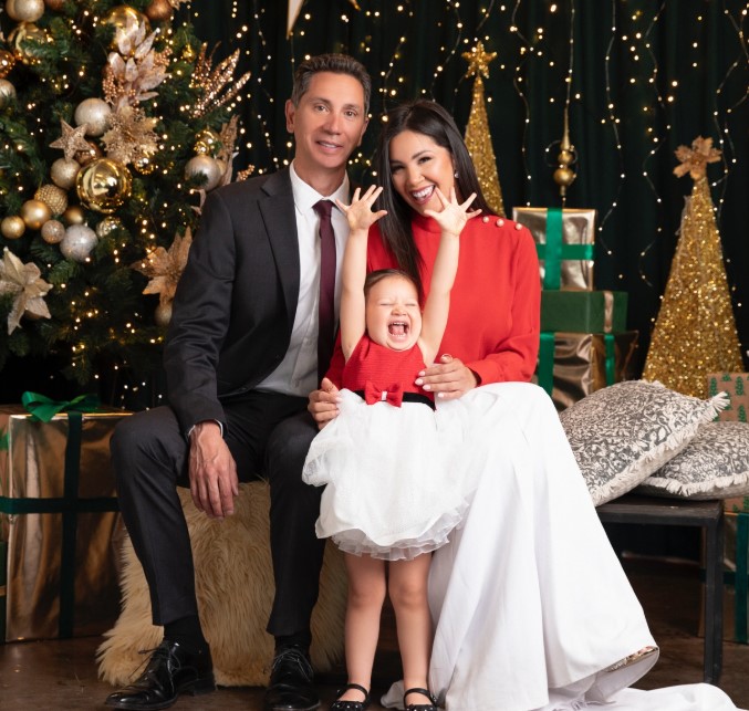 Mariuxi Dominguez with her husband and daughter