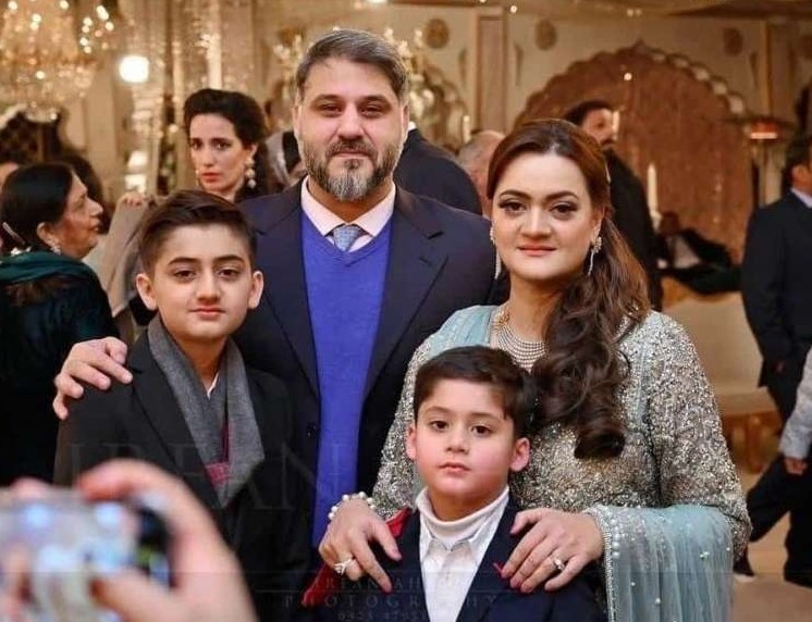 Marriyum Aurangzeb with her husband and sons