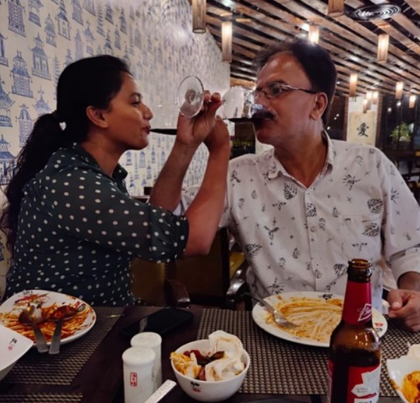Megha Thomas with her dad