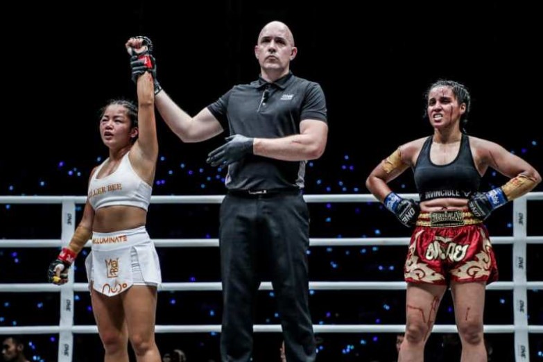Bi Nguyen (left) after winning an MMA fight