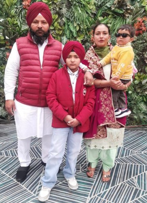 Harbrinder Singh with his wife and sons