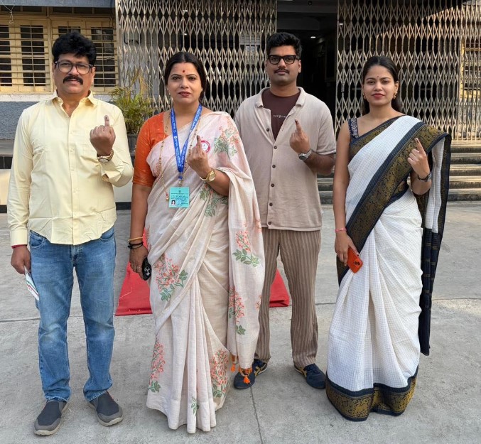 Ritu Tawde with her husband and kids
