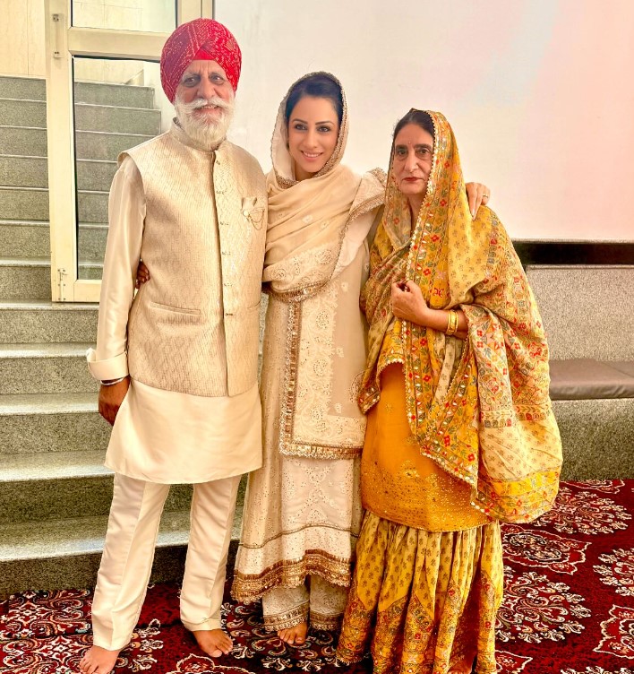 Rouble Nagi with her parents