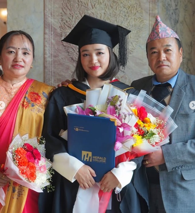 Alisha Rai with her parents