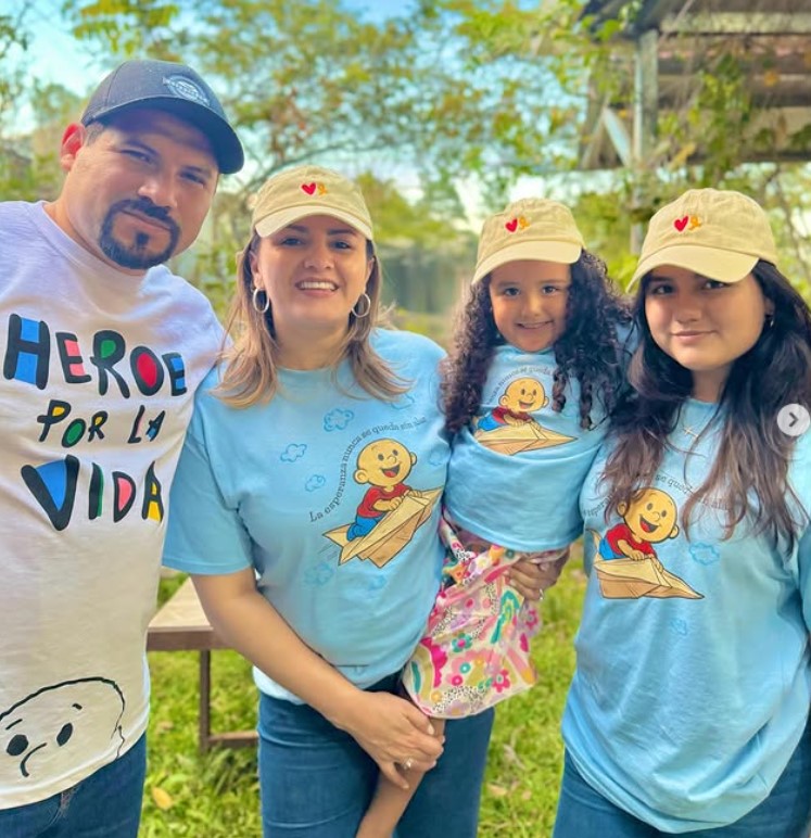 Cesia Mejia with her husband and daughters