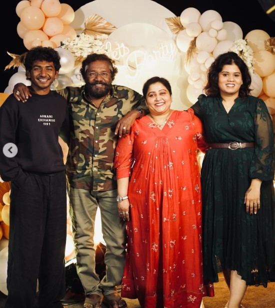 Karunas with his wife and children