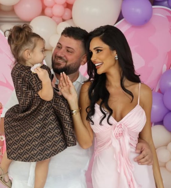 Paloma Miteva with her partner and daughter 