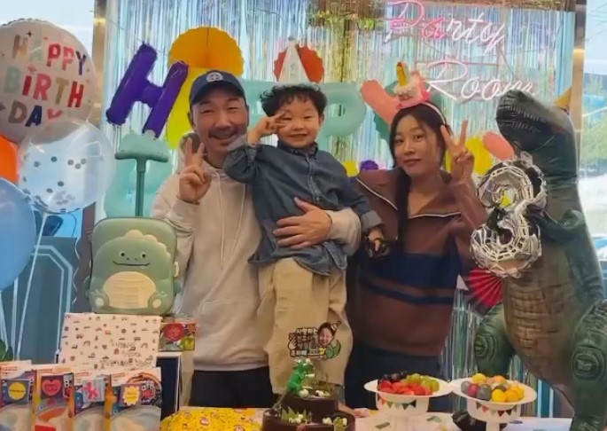 Sungah Son with her husband and son