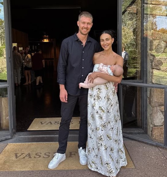 Tayla Damir with her husband and daughter