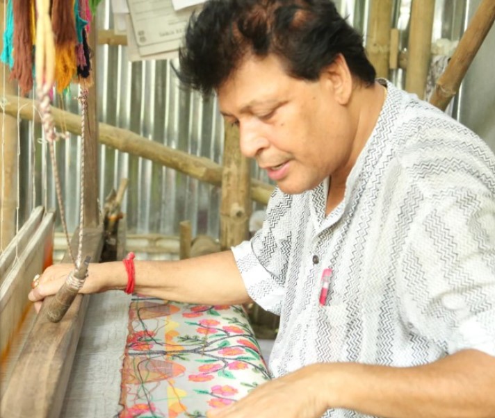 Biren Kumar Basak while weaving a sari