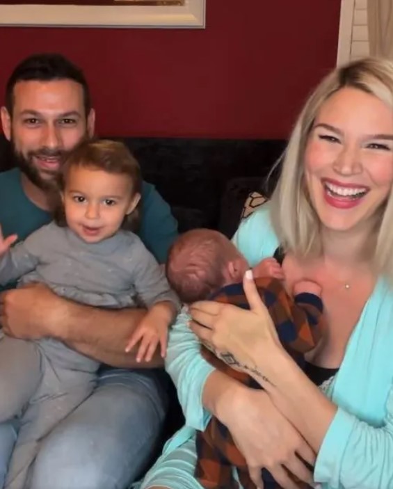 Cody DaLuz with his wife and kids