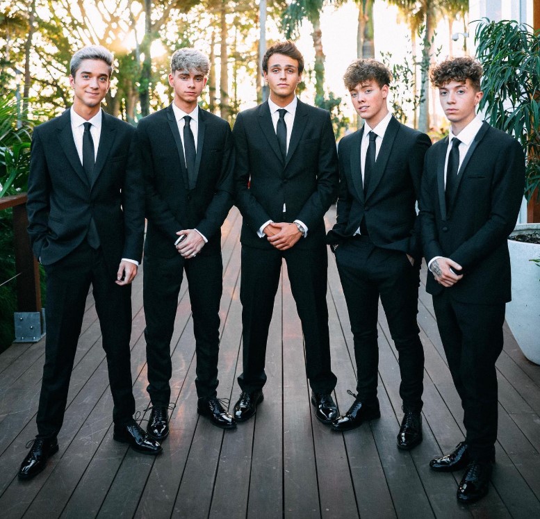 Corbyn Besson with 'Why Don't We' Band members