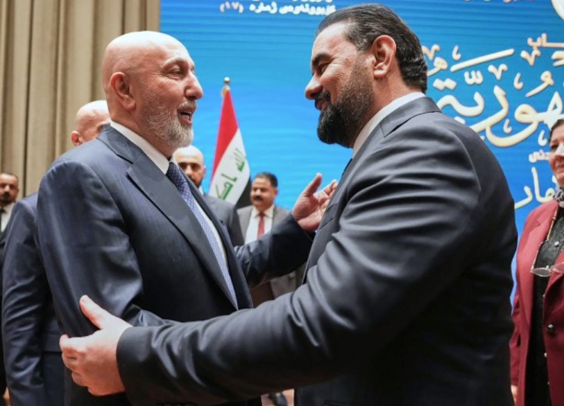 Iraq’s Parliament Speaker Haibet al-Halbousi (right) congratulates President Nizar Amidi (left) after an election in in Baghdad, Iraq