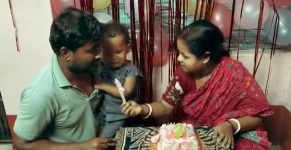Pujarini Pradhan with her husband and son
