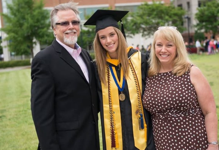 Rachel Faulkner with her parents