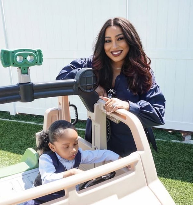 Tanisha Thomas with her kid