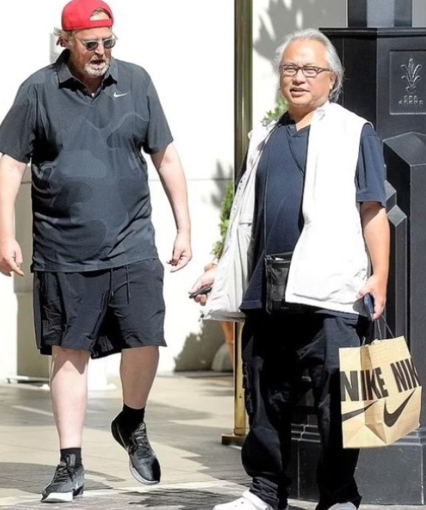 An old picture of Kenneth Iwamasa (right) with Matthew Perry (left)