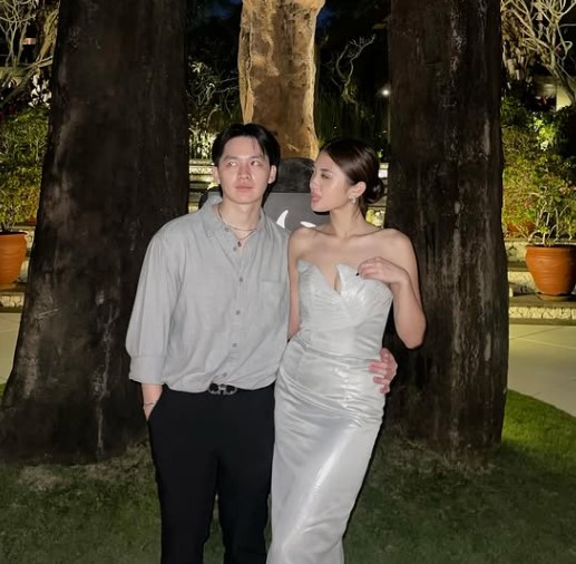Edward Candra with his girlfriend