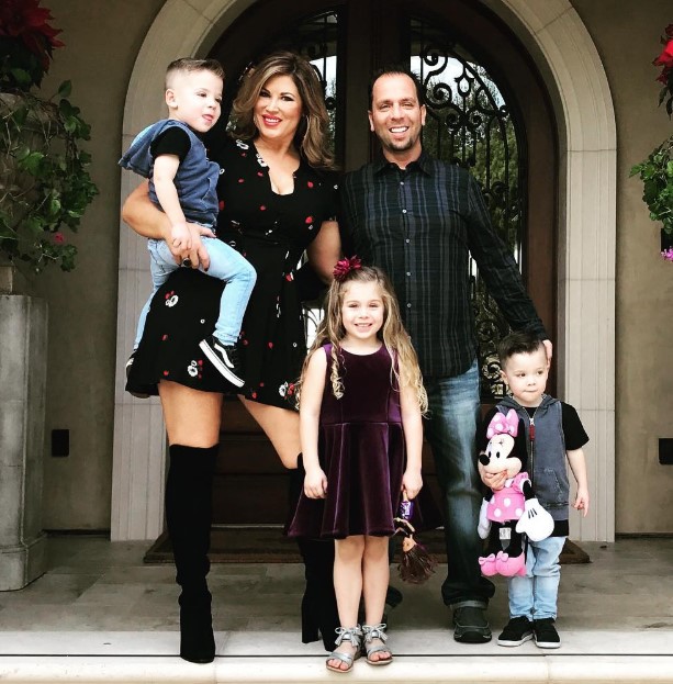 Emily Simpson with her husband and kids
