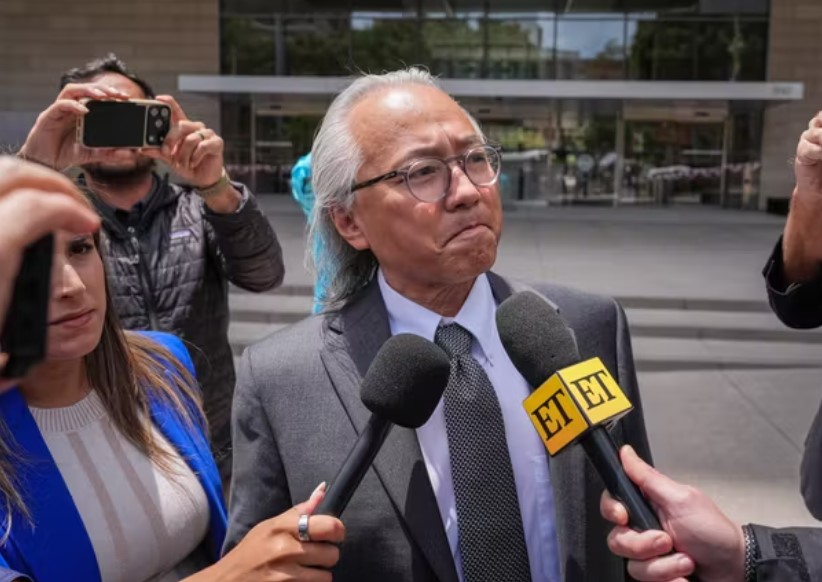 Erik Fleming departs federal court in Los Angeles after being sentenced in connection with the ketamine overdose death of actor Matthew Perry
