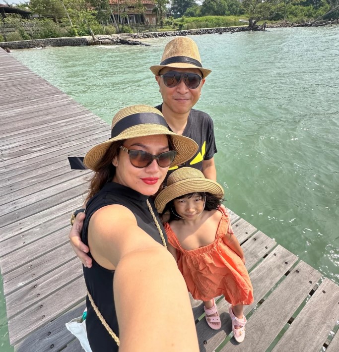 Jenny Cortez with her husband and daughter
