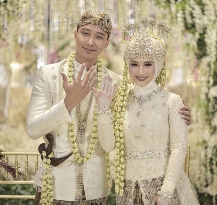 Melody Nurramdhani Laksani with her husband