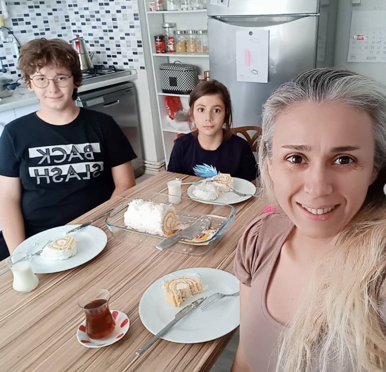 Ozlem Baysan with her son and daughter