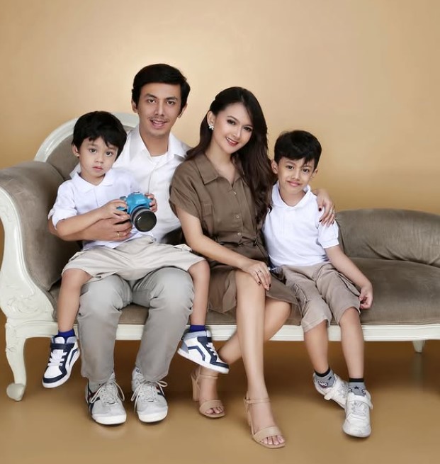 Rosnita Permata with her husband and kids