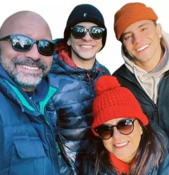 Victor Lamoglia with his parents and brother