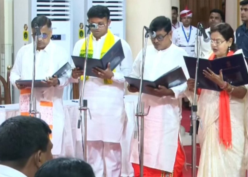 A picture of Biraj Biswas (second left) when he was taking oath as an Minister of State along with others