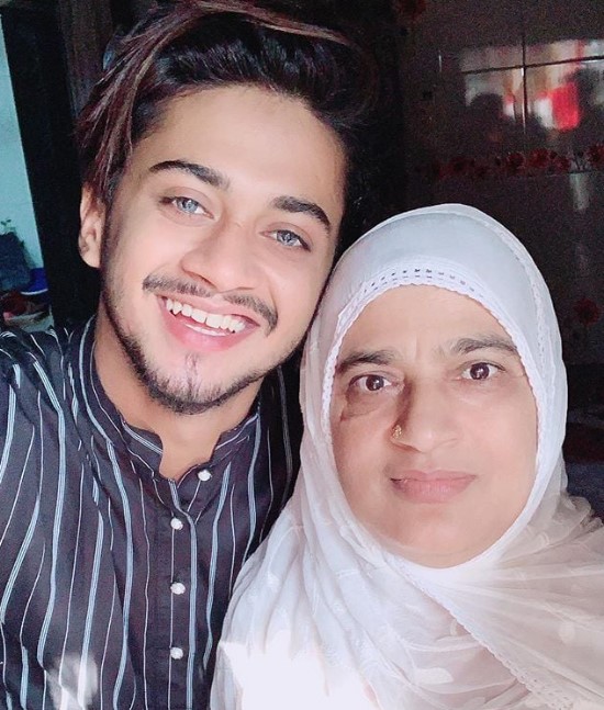 Hasnain Khan with his mother