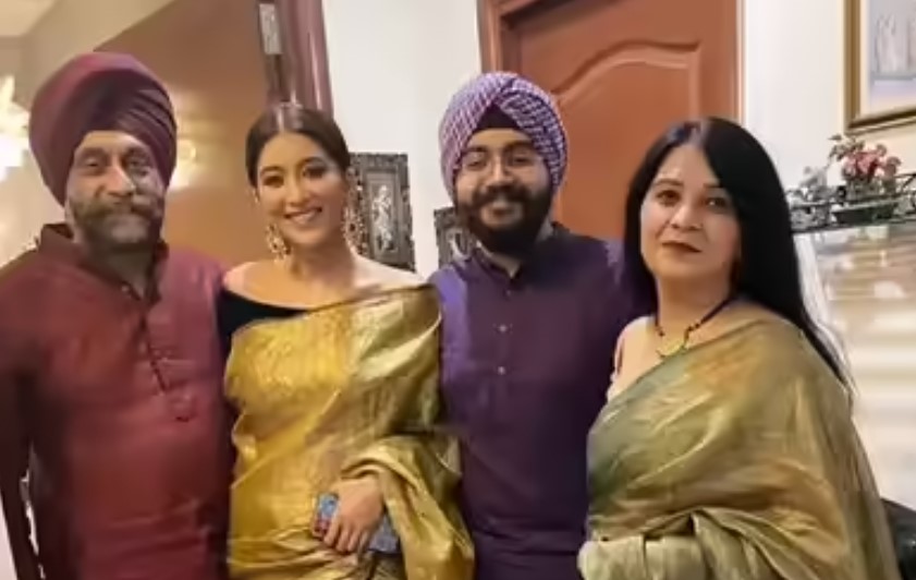 Nimrit Kaur Ahluwalia with her parents
