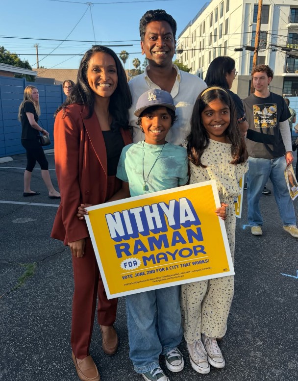 Nithya Raman with her husband and kids
