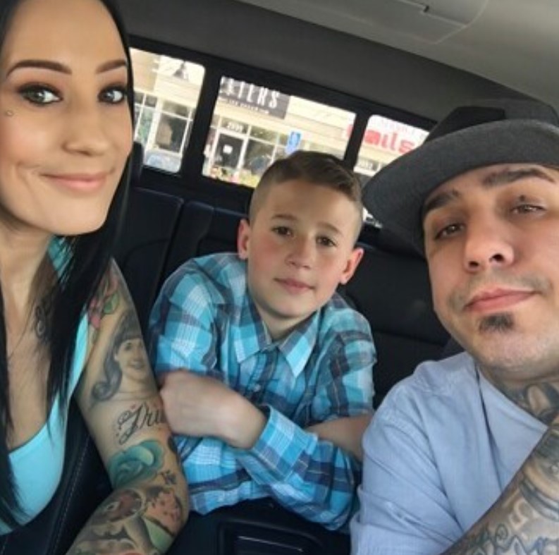 Tommy Montoya with his wife and son