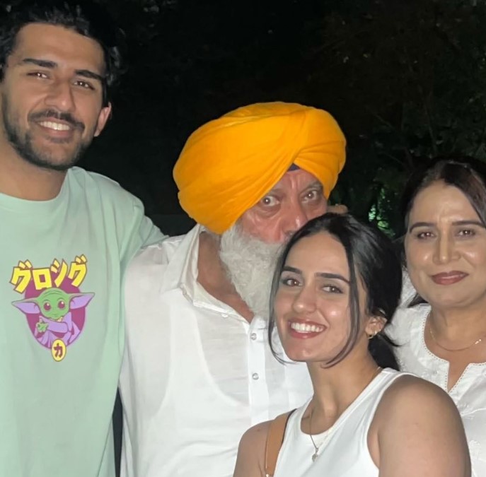 Amy Bundhel with her mother, father and brother