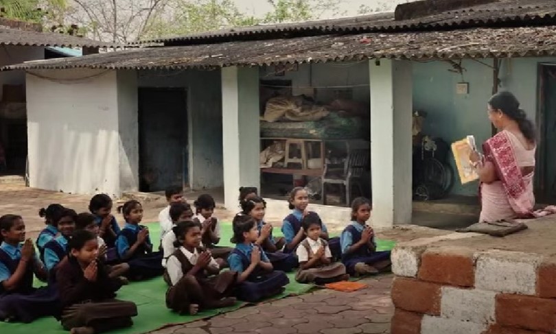 Budhri Tati teaching at her school