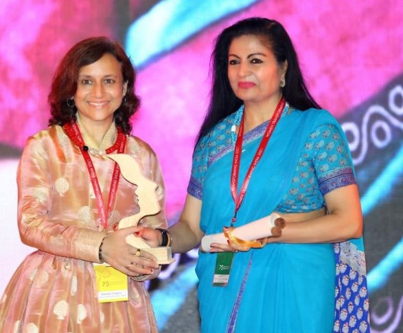 Gitanjali J Angmo (left), while receiving her Women Transforming India Award (2022)