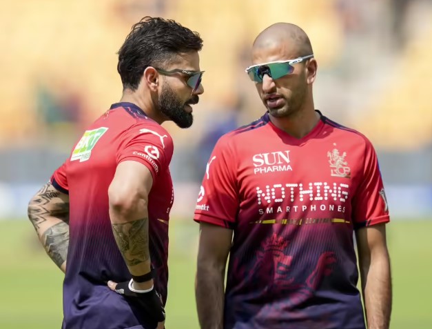Mo Bobat with Virat Kohli