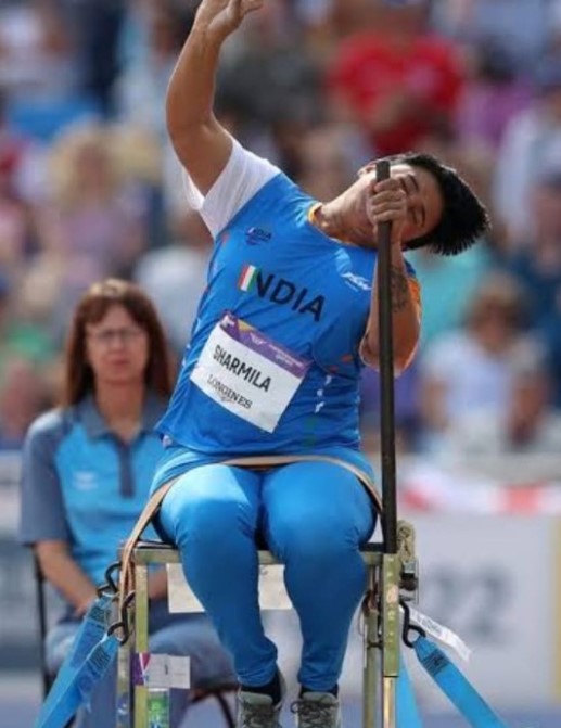 Sharmila Dhankar while throwing shot put