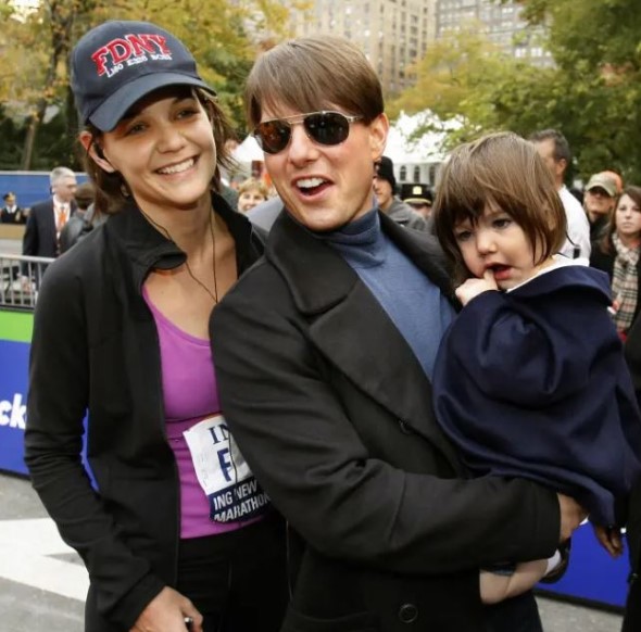Suri Noelle's childhood image with her parents